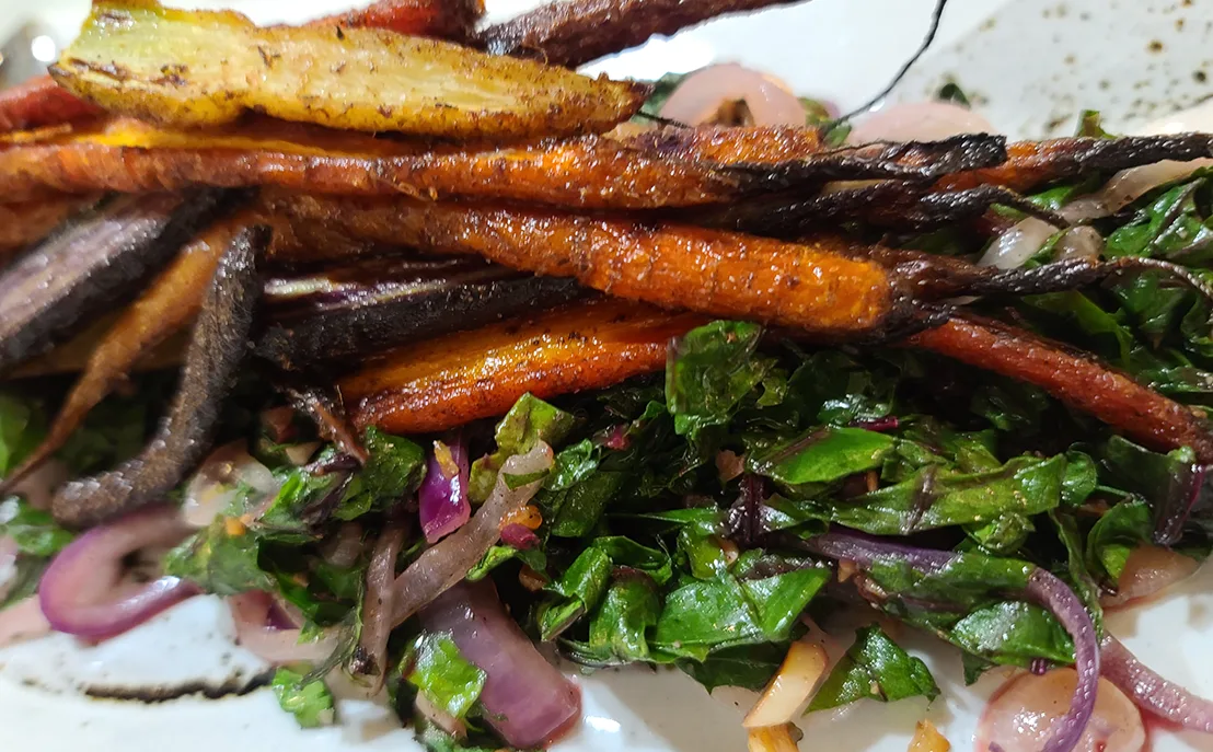Roasted carrots - greens and shallots